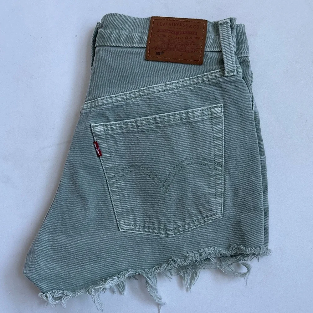 Levi’s Dusty Lily Pad Raw Hem Buttonfly Denim Jean Shorts Olive Green Size 27